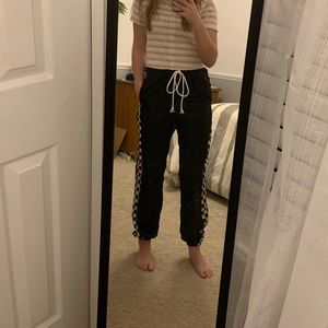 NWOT black and white wind pants